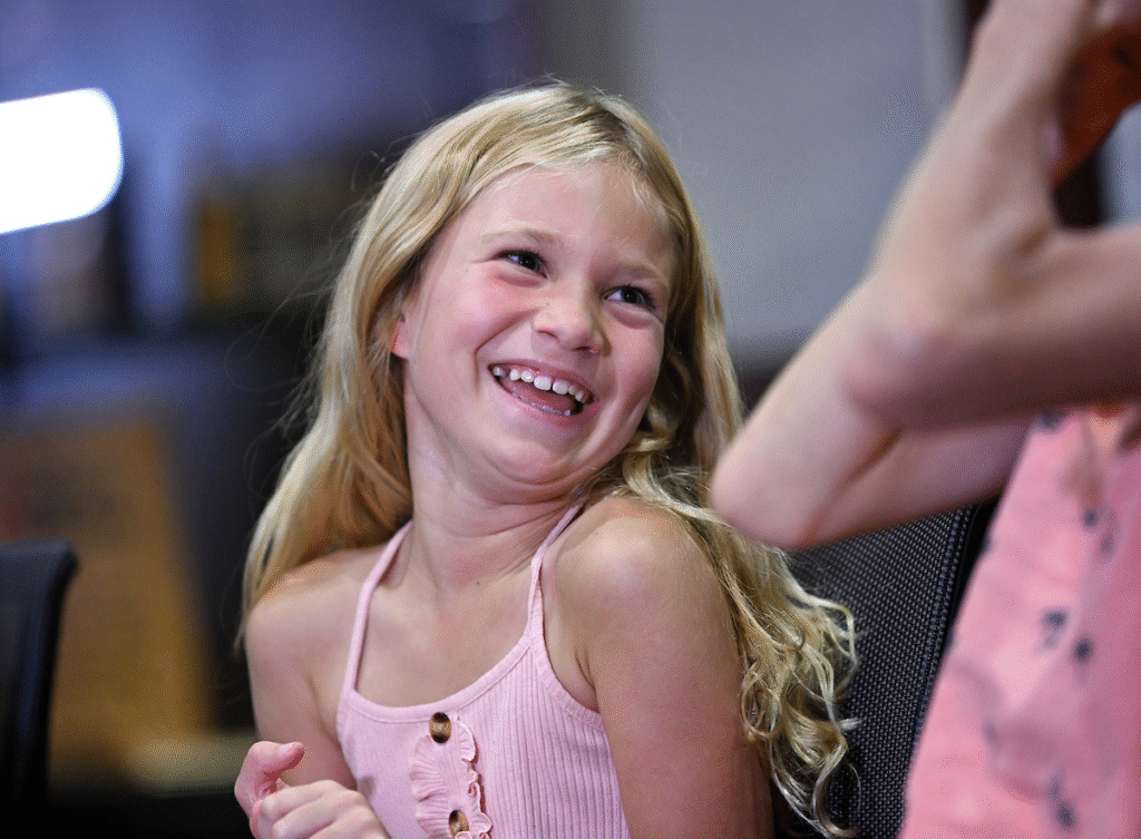 An image of Riley smiling after the surgery.